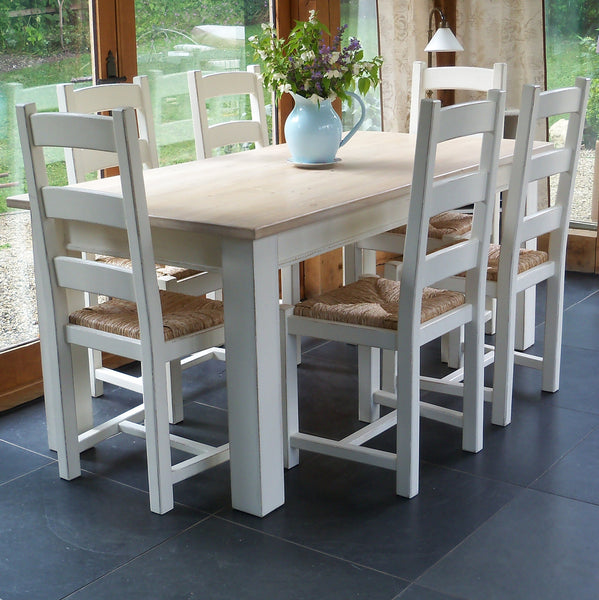 painted table and ladder back chairs